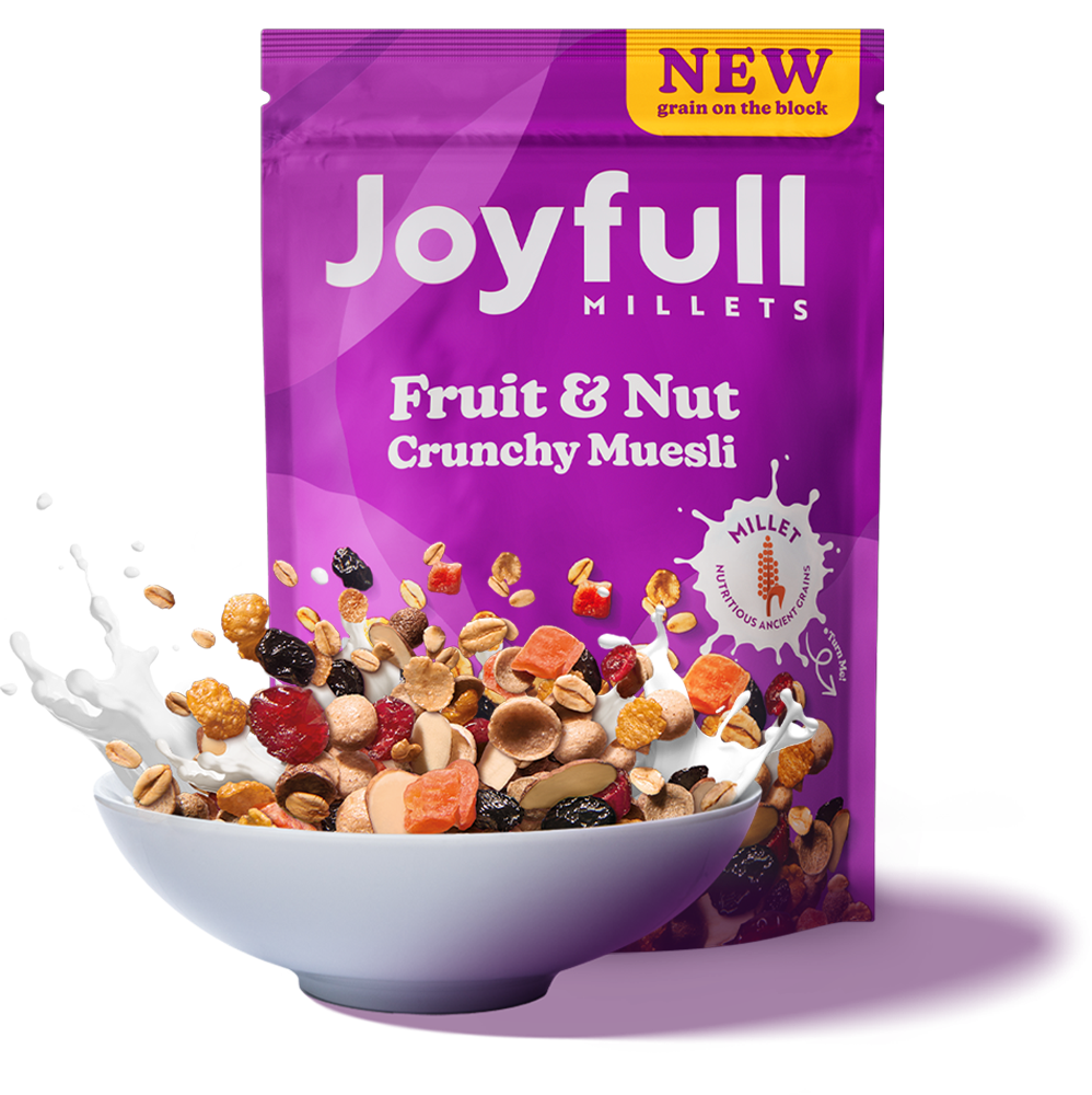 A graphic image with a purple background. On the left, it has a purple pack of Joyfull Fruit and nut crunchy healthy muesli. In front of the pack, there is a bowl with muesli made with millet, and milk splashing out of it.